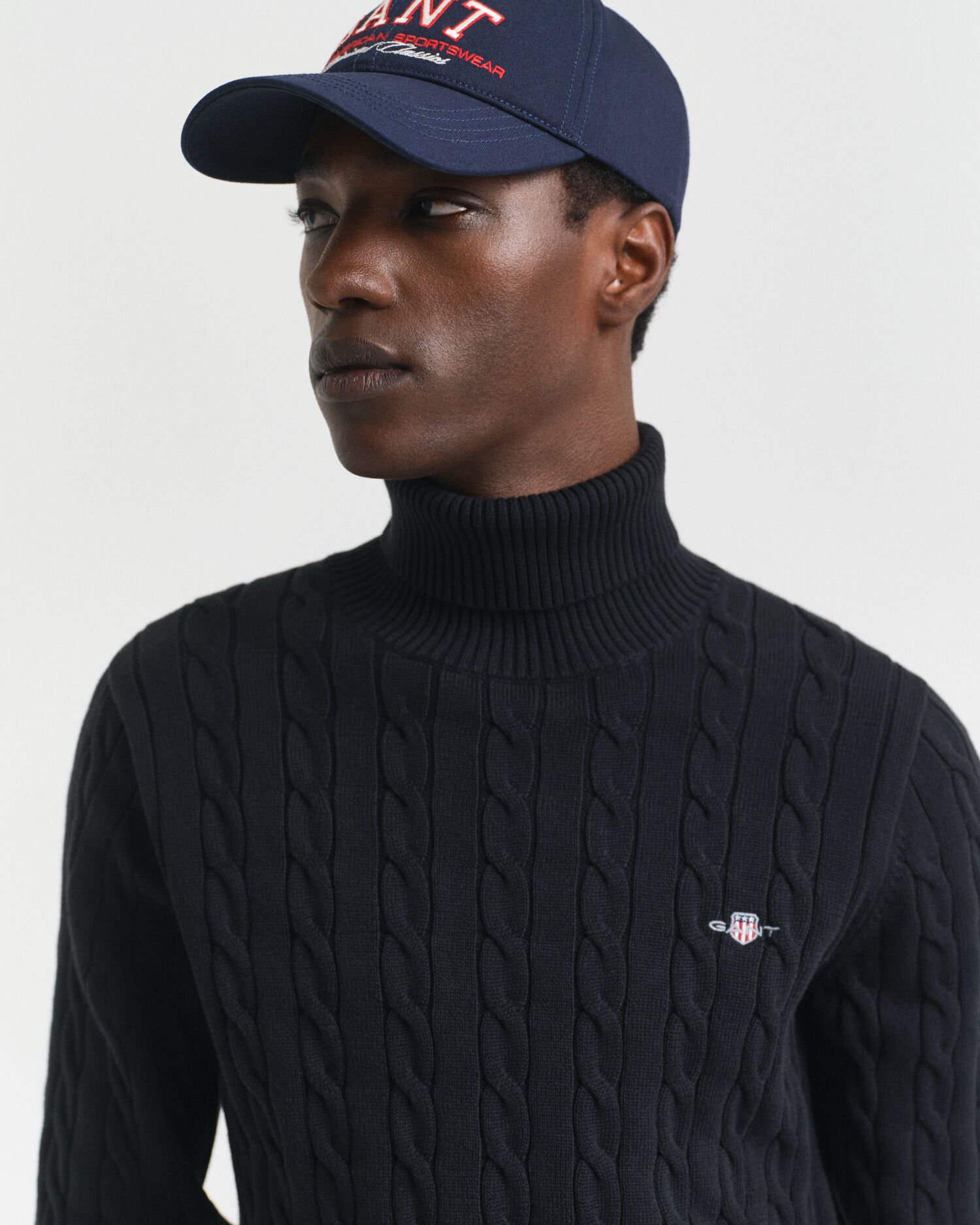 Jersey de punto de ochos de algodón con cuello de cisne