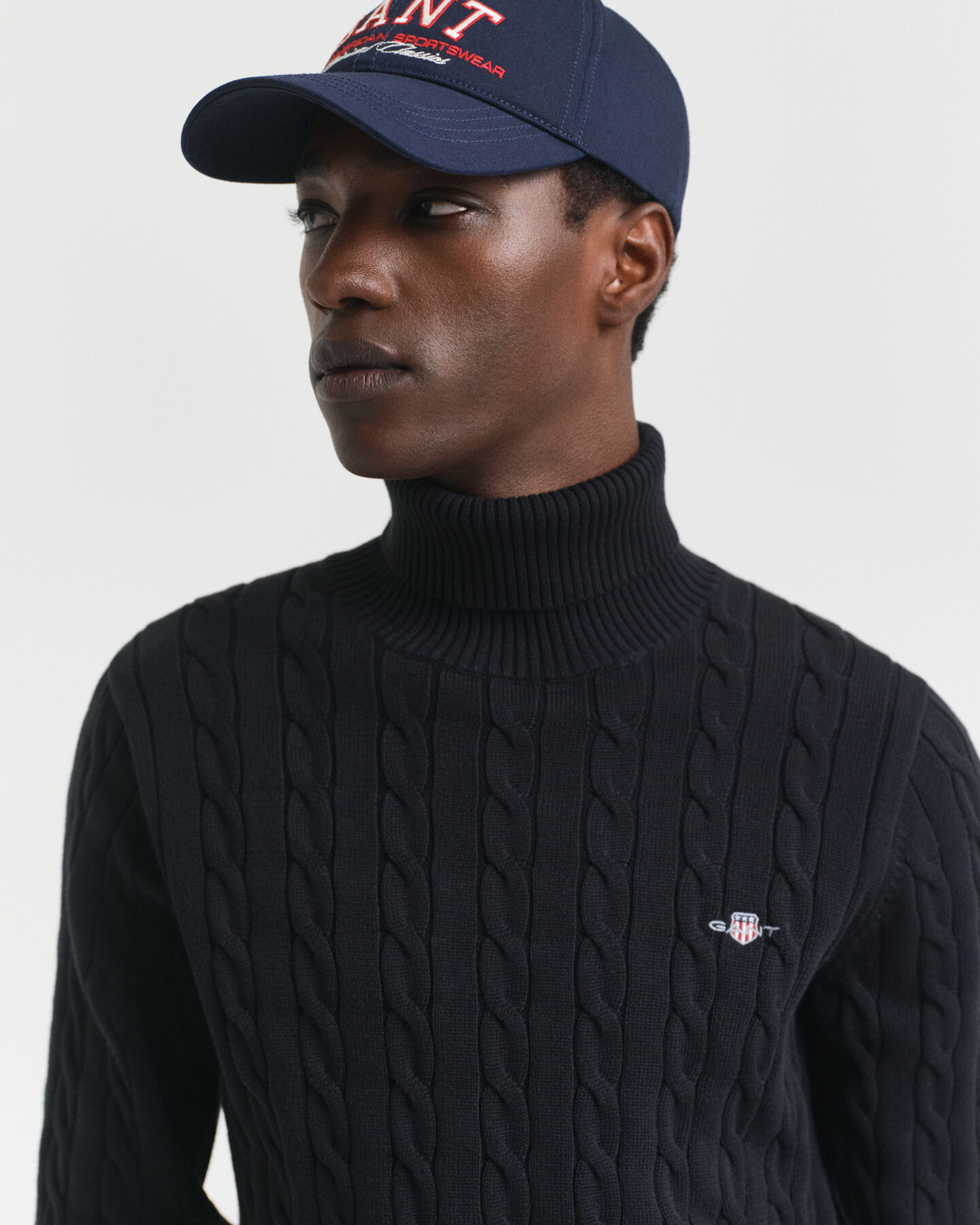 Jersey de punto de ochos de algodón con cuello de cisne