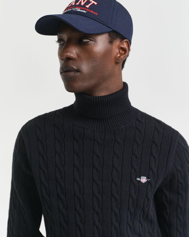 Jersey de punto de ochos de algodón con cuello de cisne