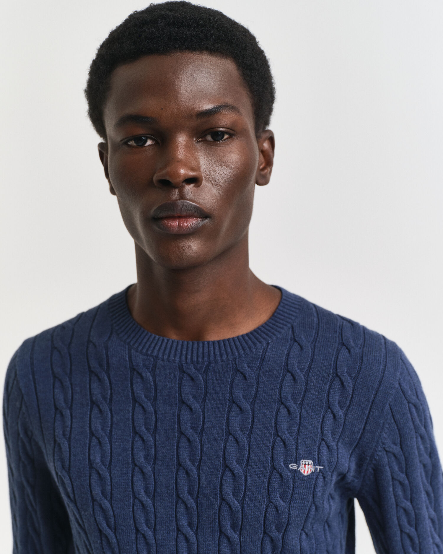 Jersey de cuello redondo y punto de ochos en algodón