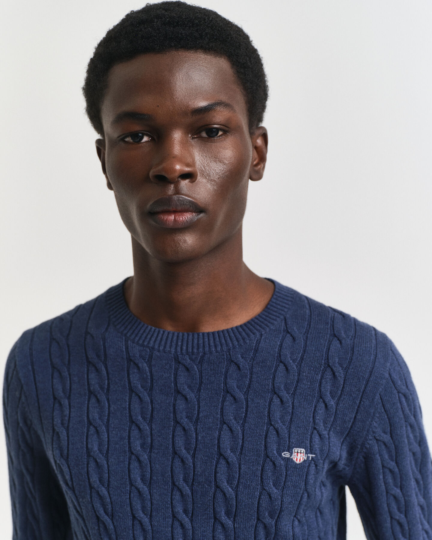 Jersey de cuello redondo y punto de ochos en algodón