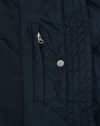 Abrigo acolchado con ribete de pana