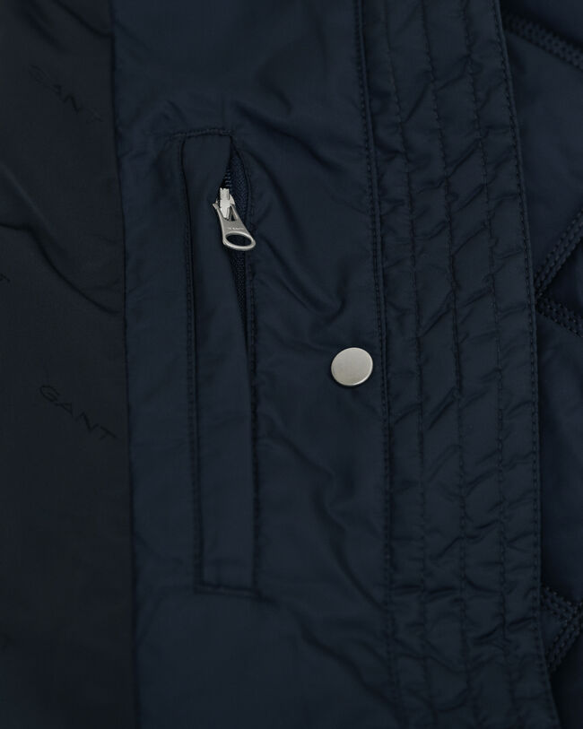 Abrigo acolchado con ribete de pana