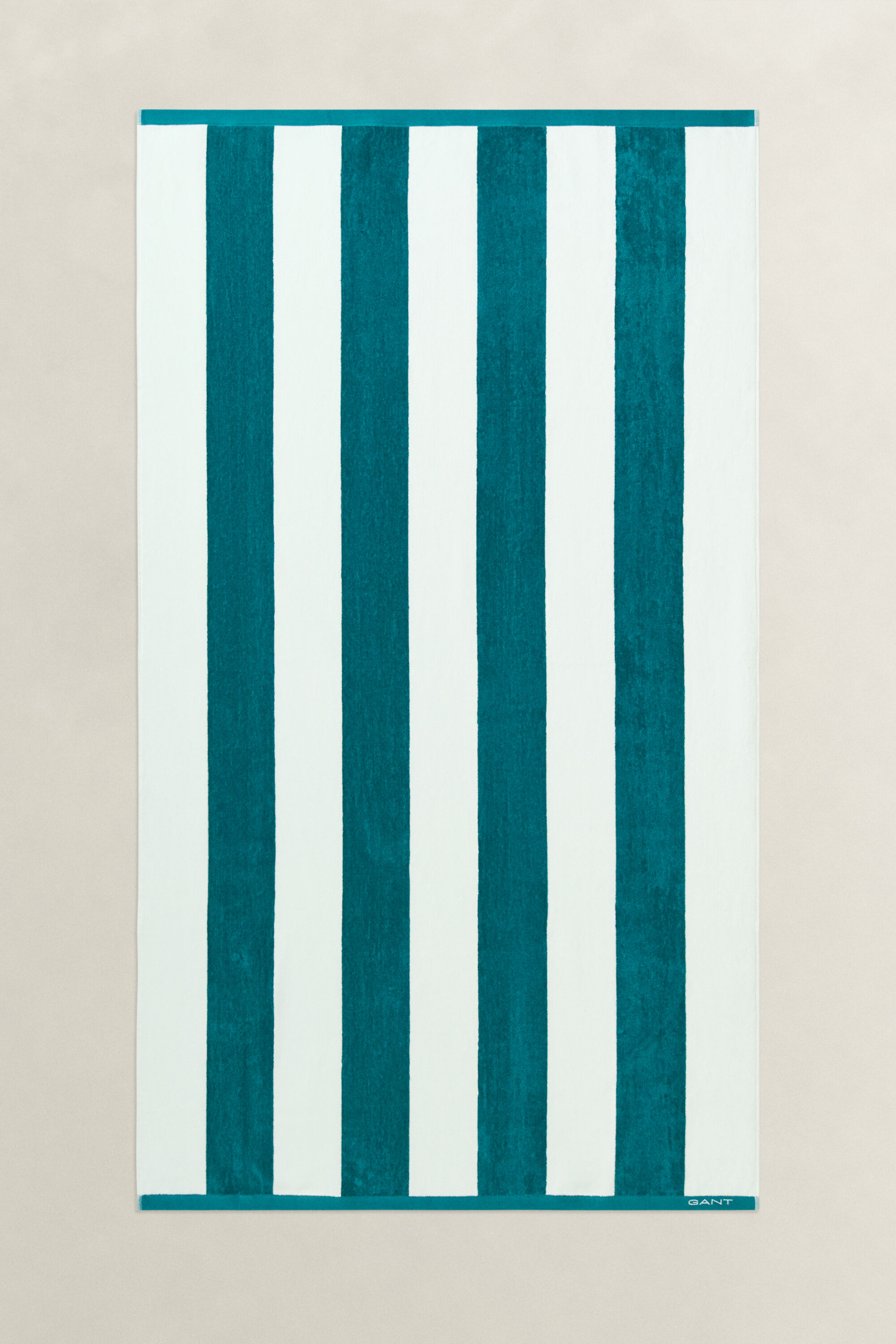 Toalla de playa de rayas gruesas