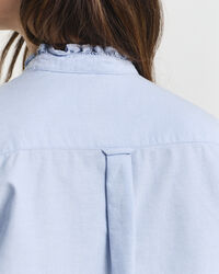 Blusa Oxford clásica con volantes