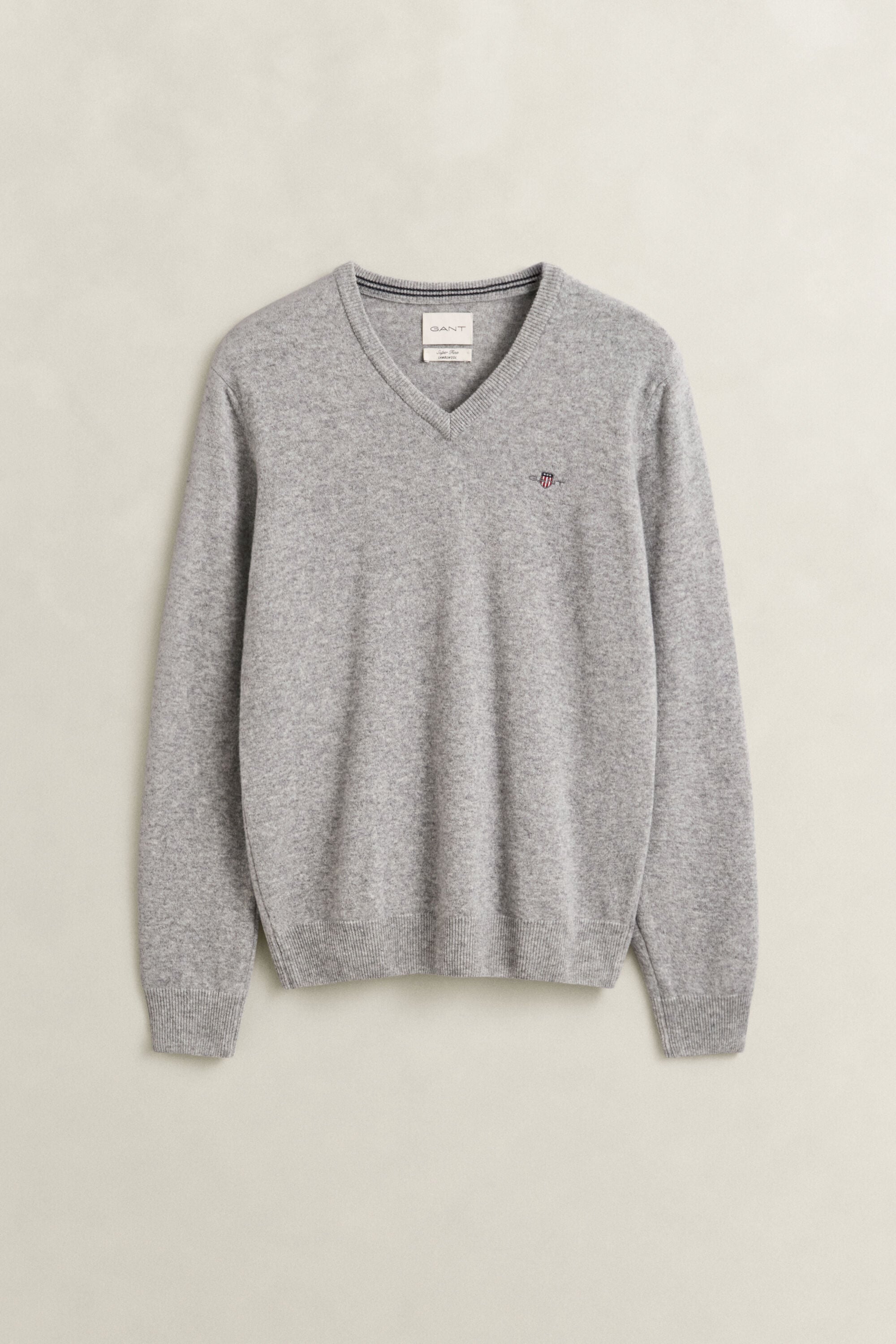 Jersey de cuello de pico en lana de oveja