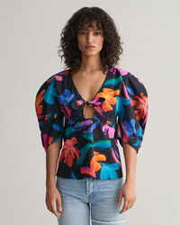 Blusa con mangas volumen y estampado de flores