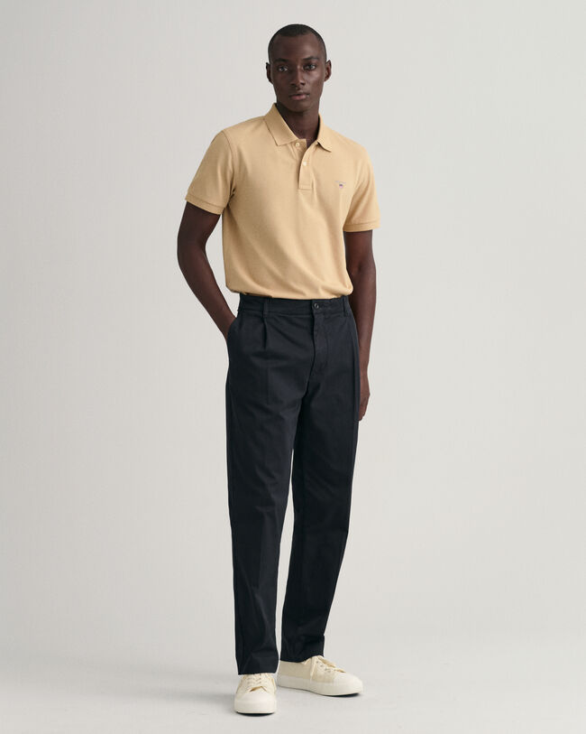 Pantalones de pinzas ajustados en el bajo