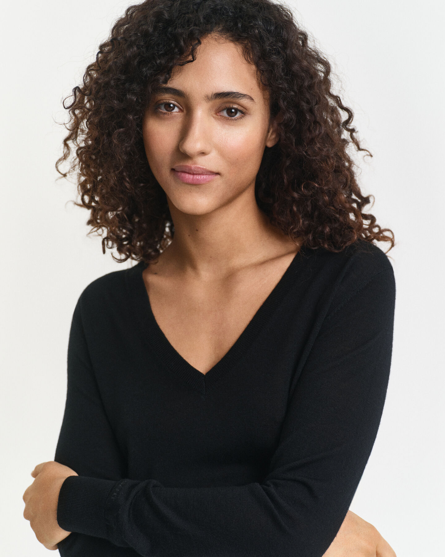 Jersey de lana merino extrafina con cuello de pico