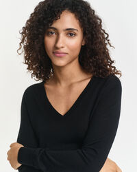 Jersey de lana merino extrafina con cuello de pico