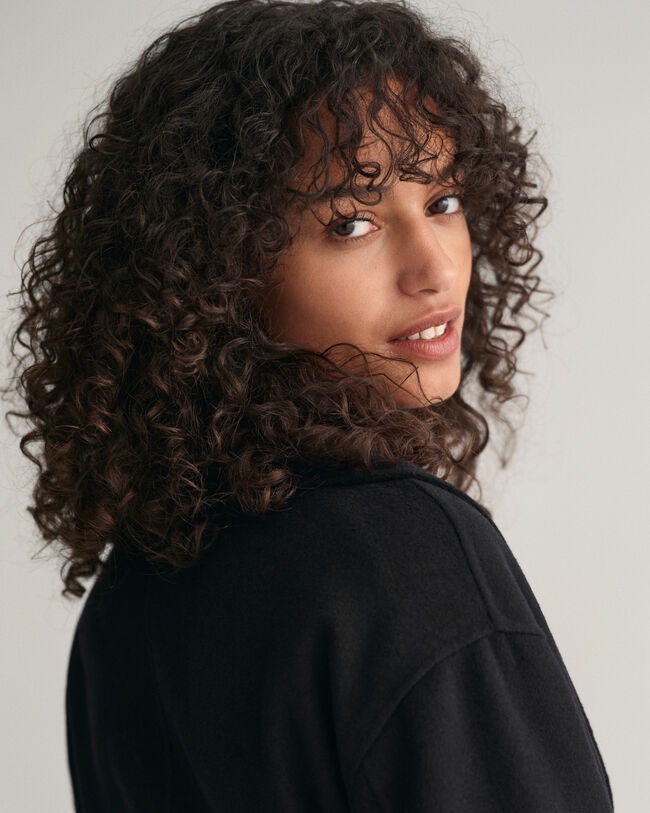 Abrigo cosido a mano con cintur&oacute;n