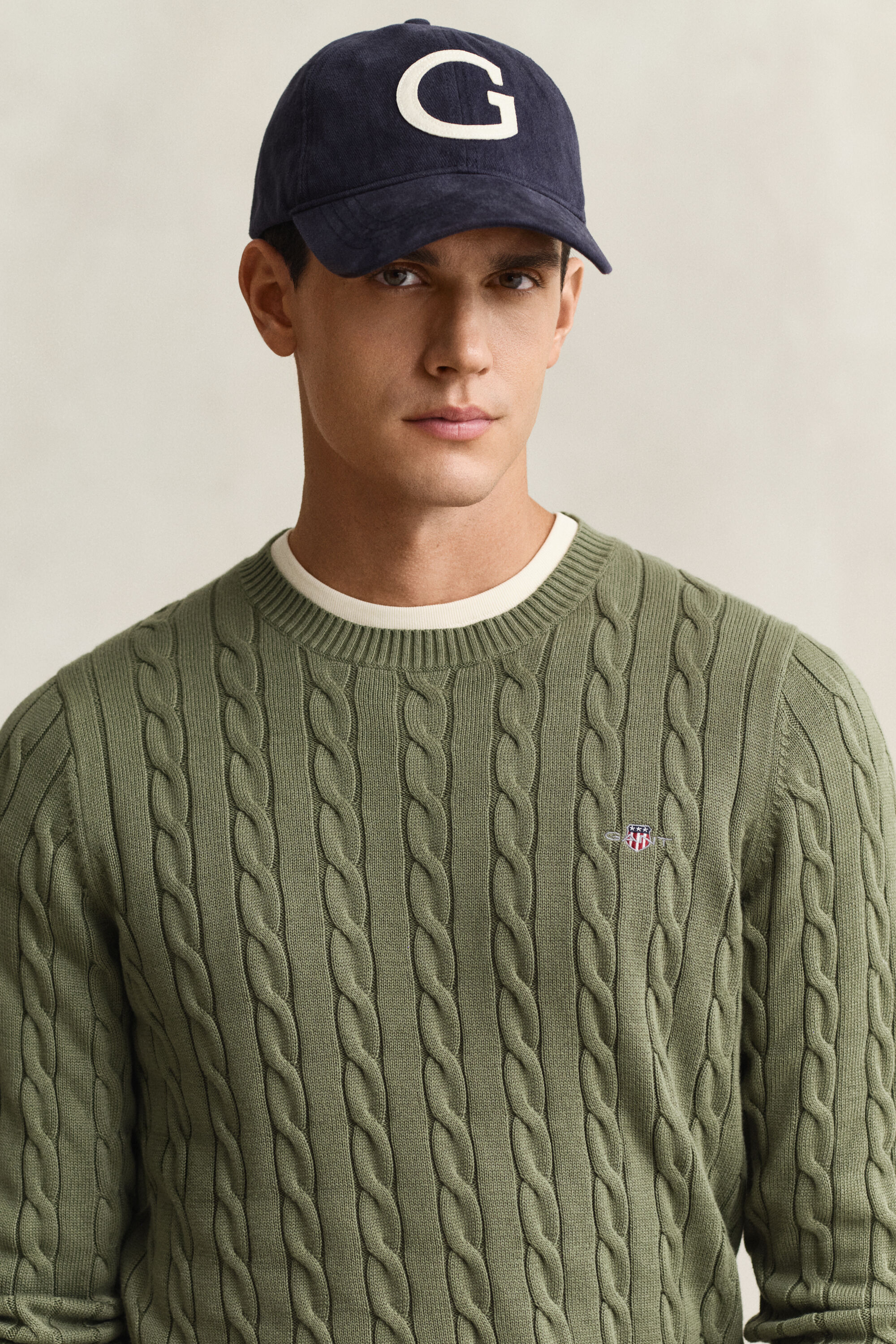 Jersey de cuello redondo y punto de ochos en algodón