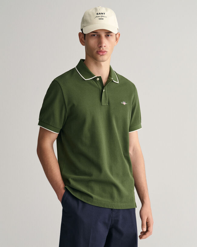 Polo de piqu&eacute; con ribete enmarcado