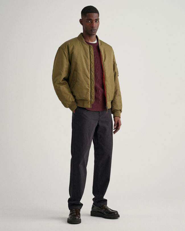 Jersey de cuello redondo y punto de ochos en lana de oveja