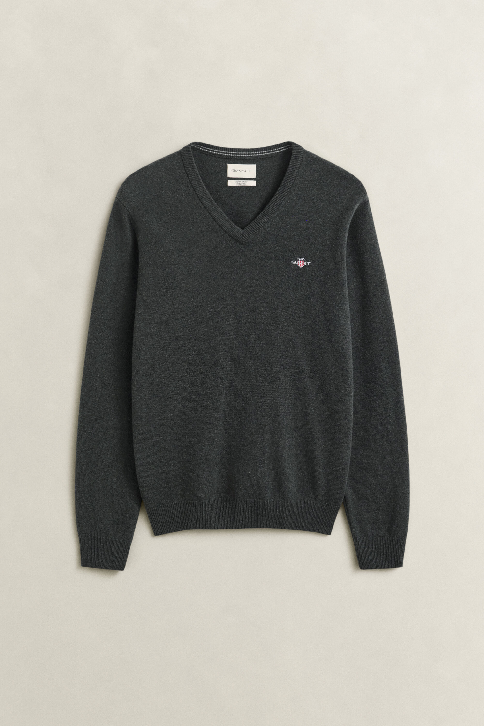 Jersey de cuello de pico en lana de oveja