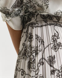 Falda midi plisada con estampado de árboles