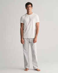 Caja de regalo con camiseta y pantalones de pijama a rayas