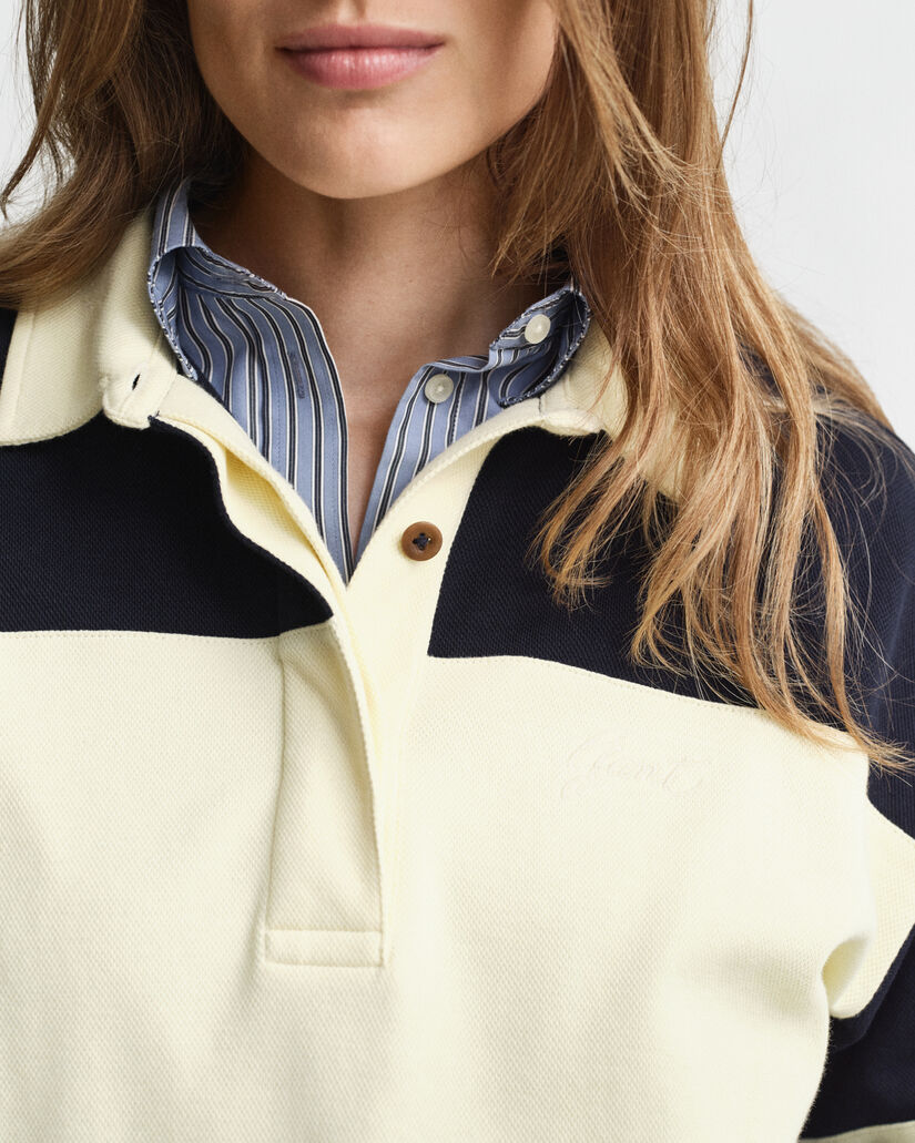 Rugger con bloques de color y textura de piqué