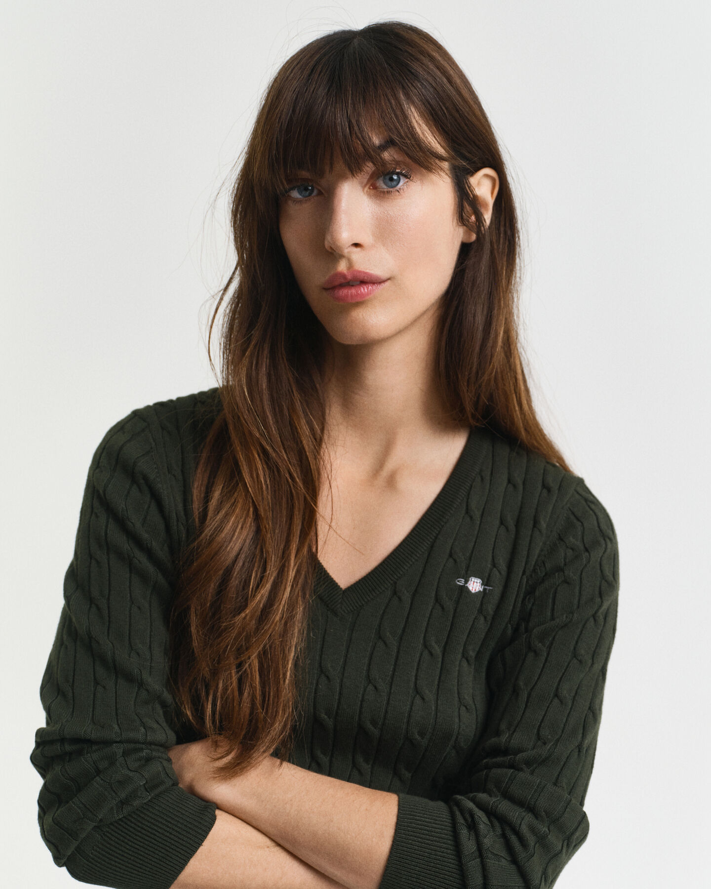 Jersey de punto de ochos con cuello de pico en algodón elástico