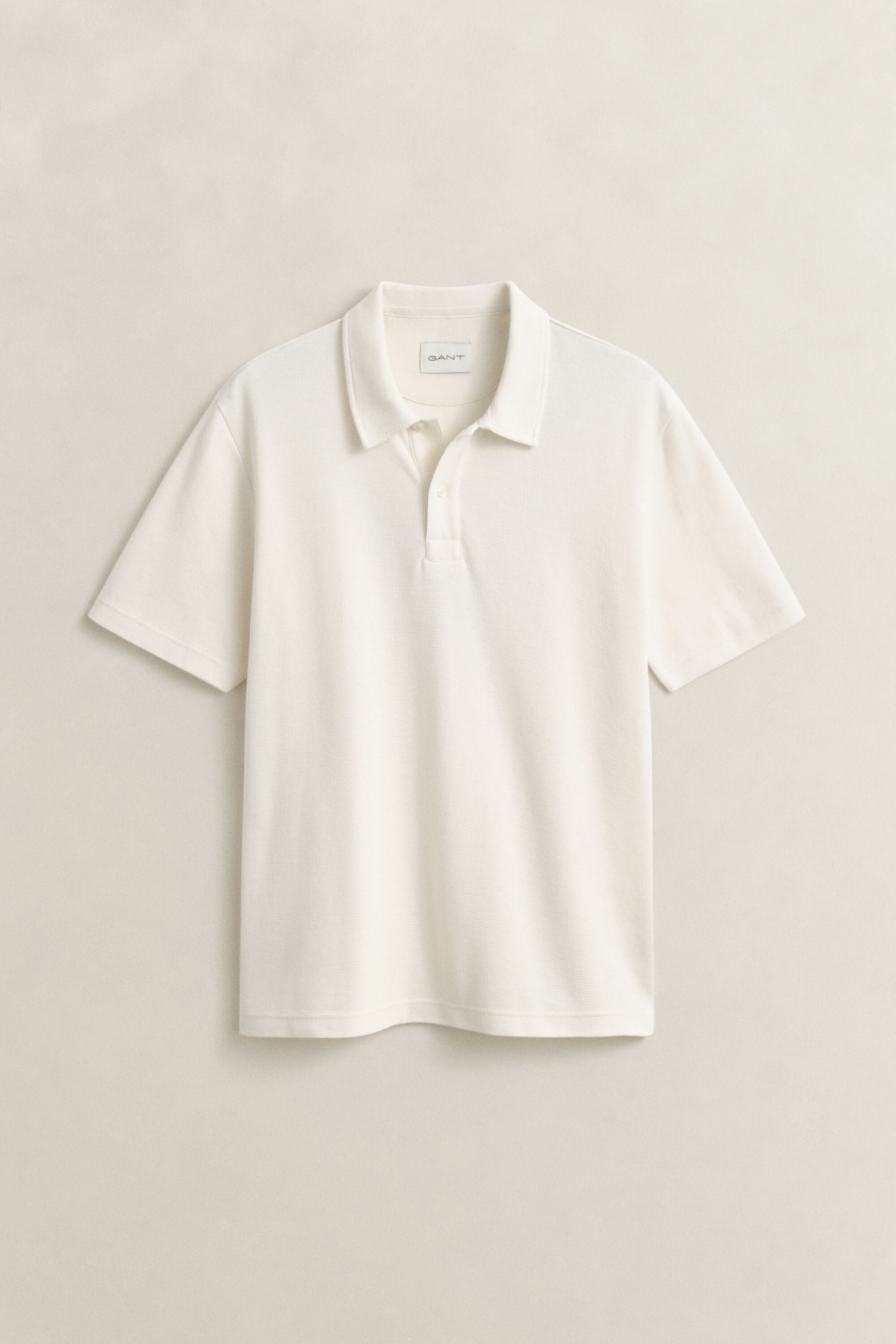 Polo con textura de nido de abeja