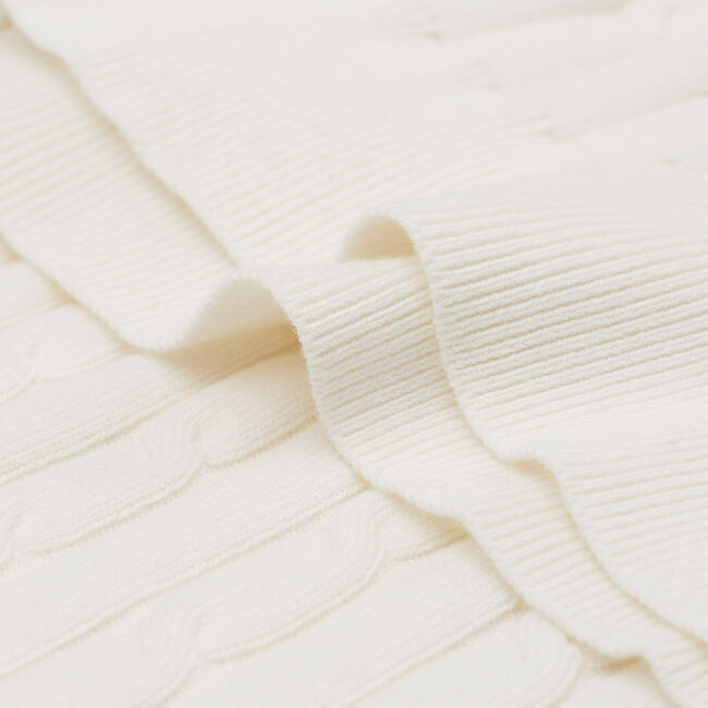 Jersey con cuello de cisne de punto de ochos en algod&oacute;n el&aacute;stico