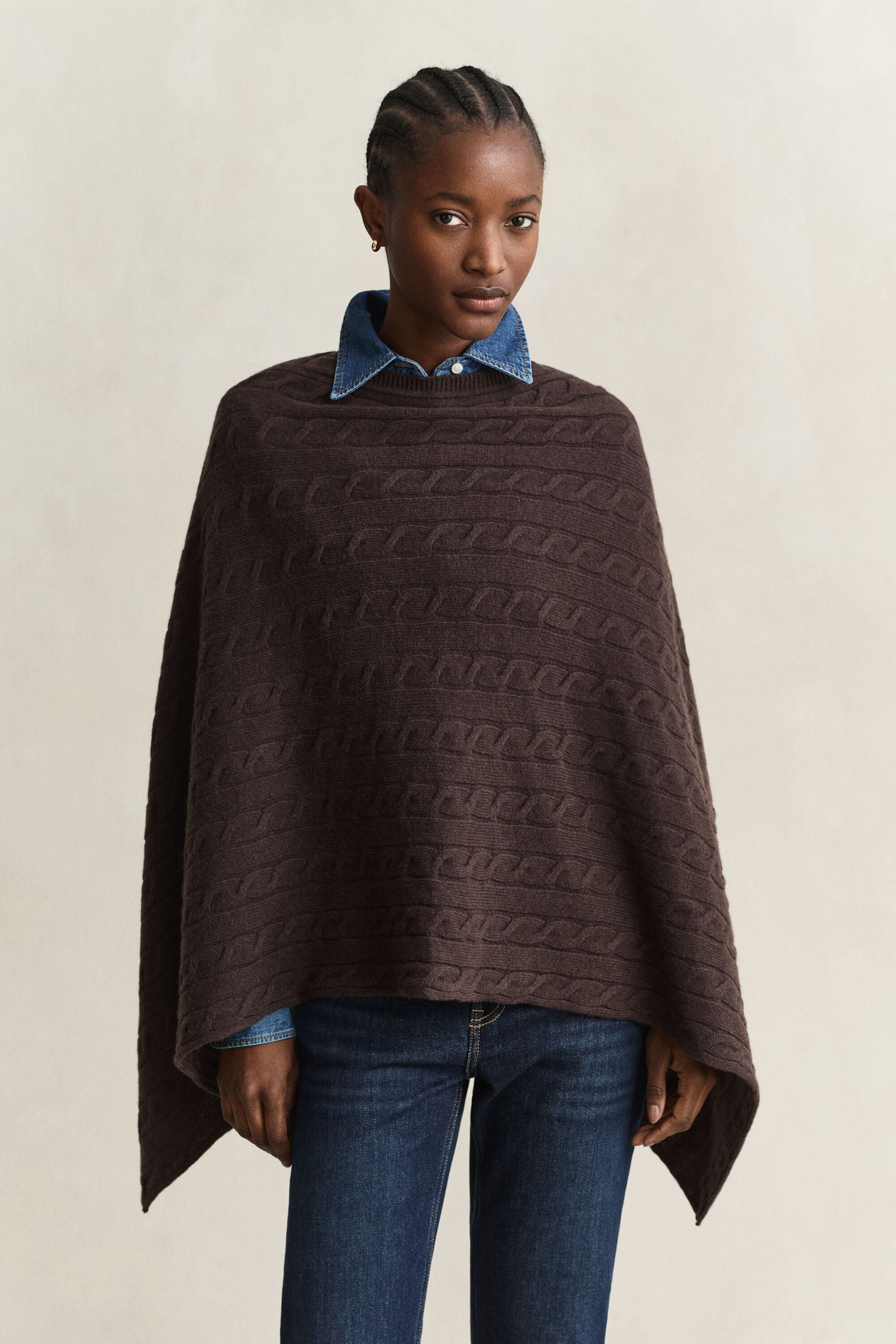 Poncho de punto de ochos de lana
