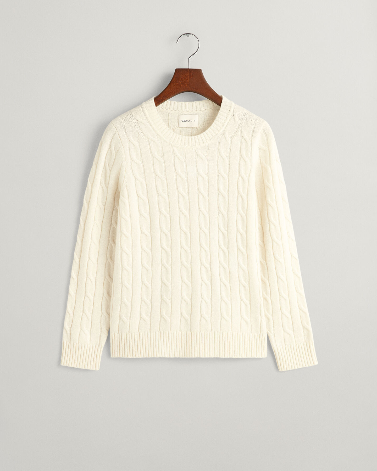 Jersey de cuello redondo y punto de ochos en lana de oveja