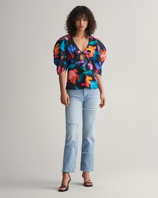 Blusa con mangas volumen y estampado de flores