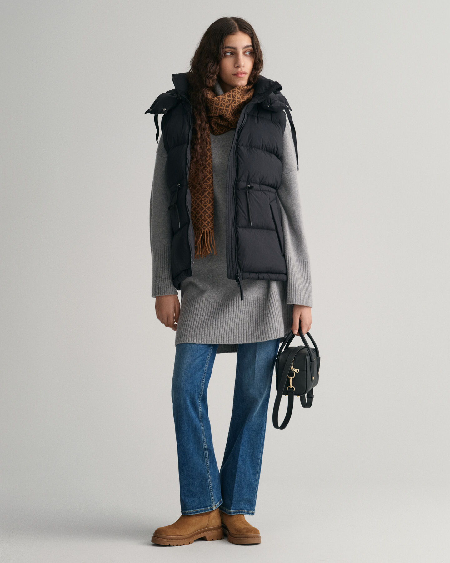 Chaleco de plumón y largo medio