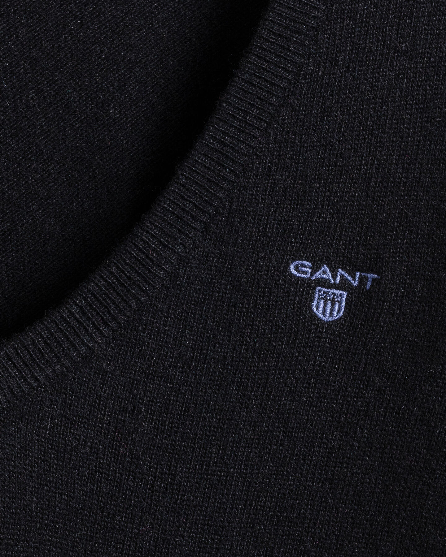 Jersey de cuello de pico en lana de oveja extrafina