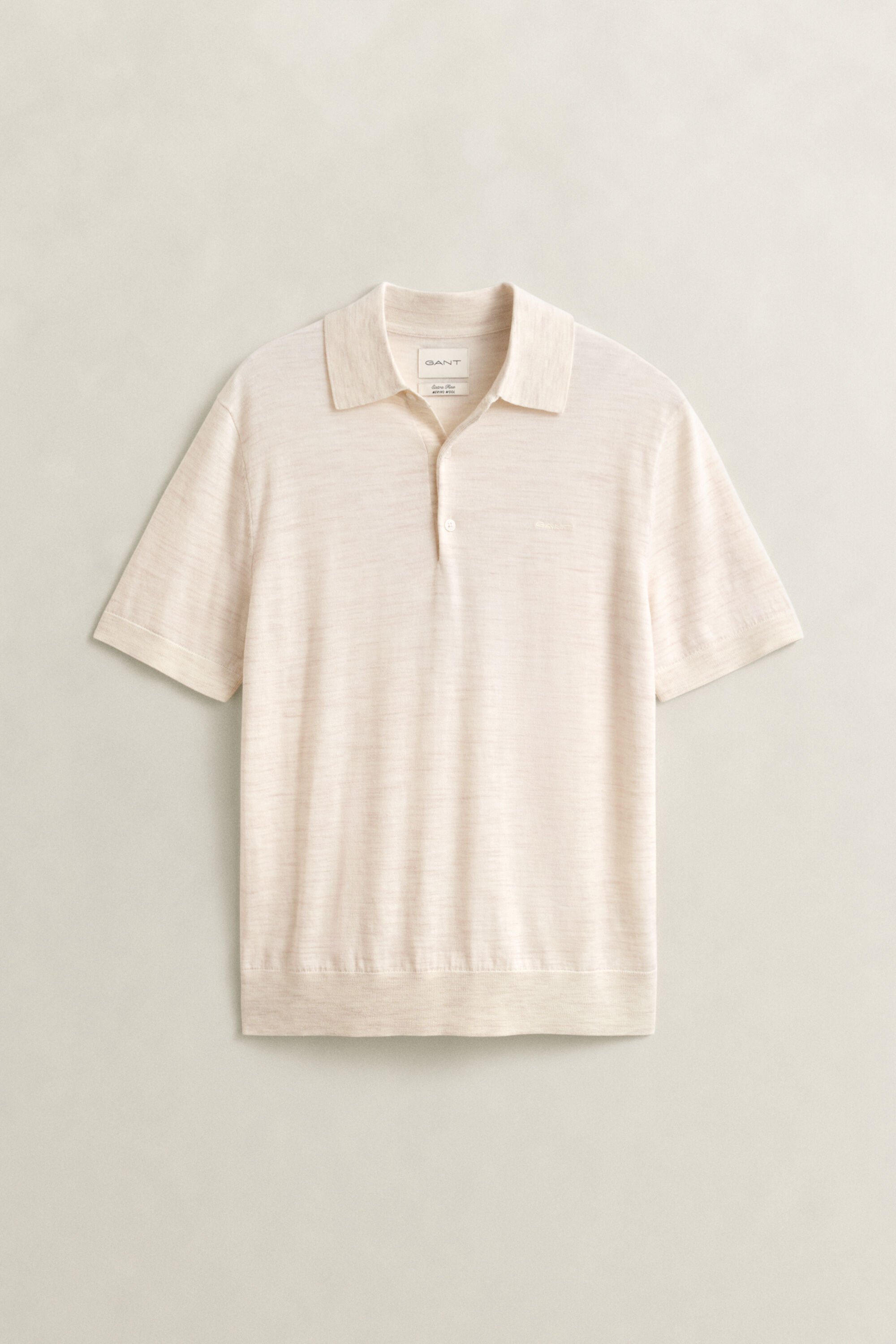 Jersey tipo polo de manga corta de lana merino extrafina