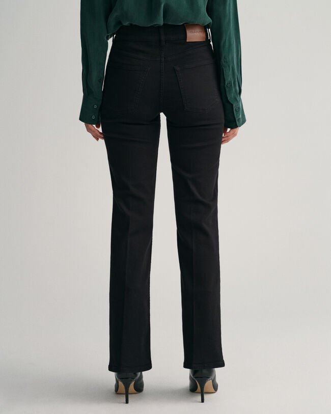 Vaqueros acampanados de color