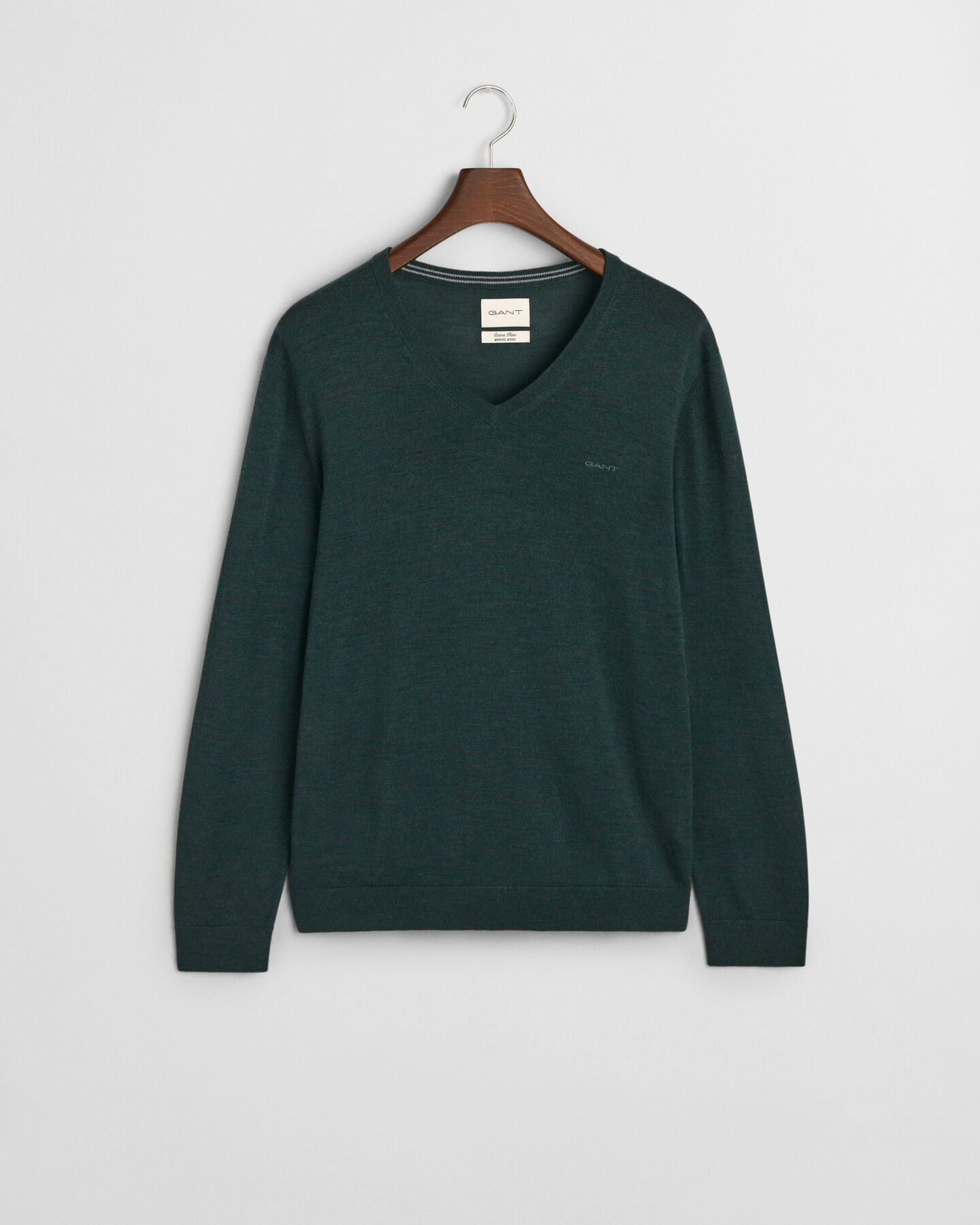 Jersey de lana merino extrafina con cuello de pico