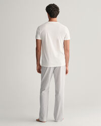 Caja de regalo con camiseta y pantalones de pijama a rayas