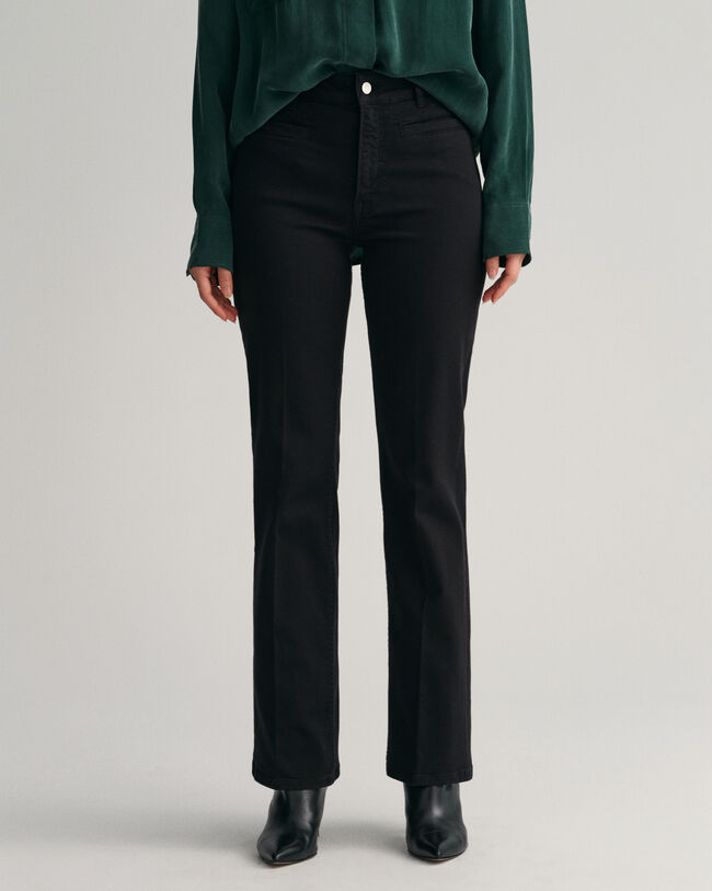 Vaqueros acampanados de color