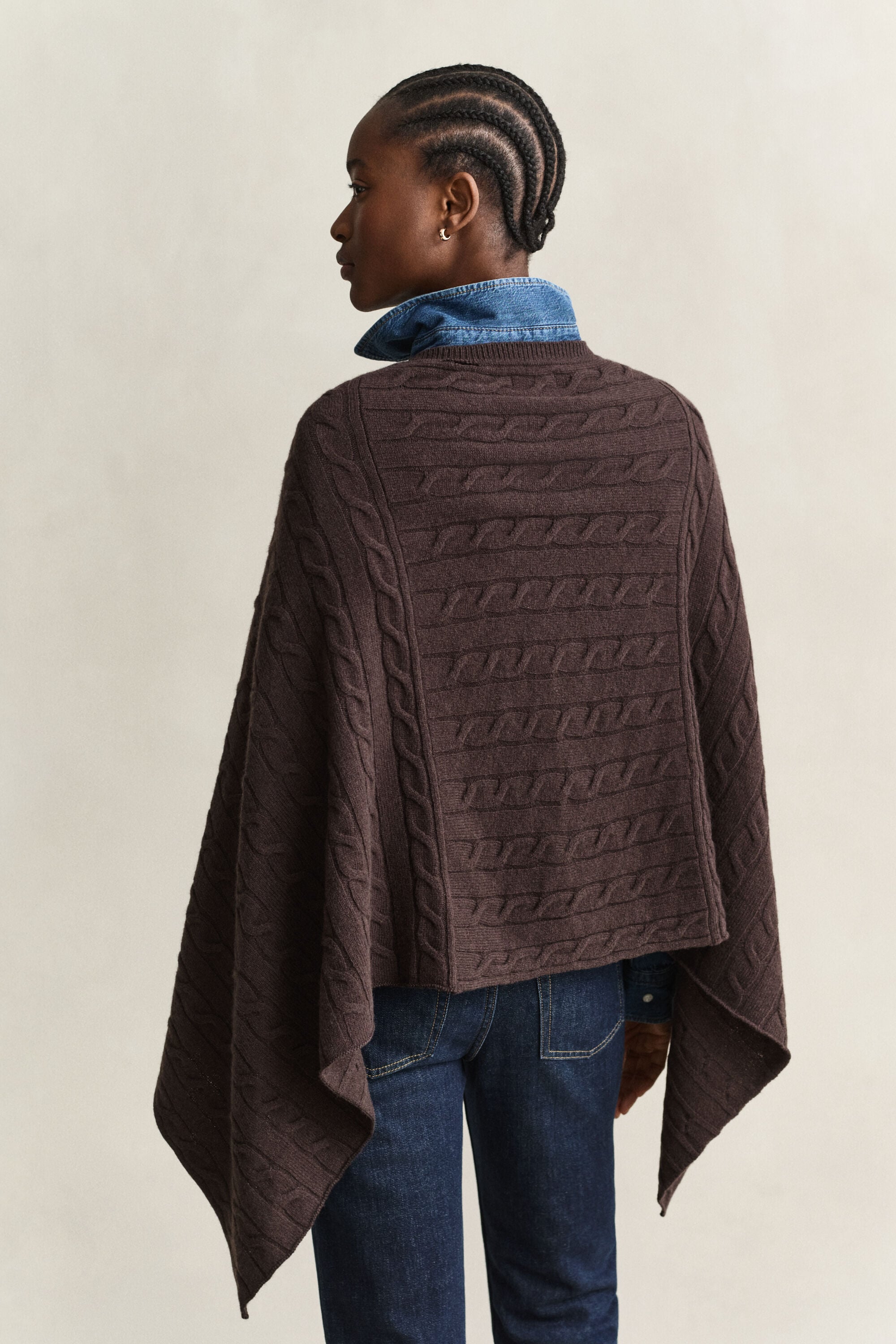 Poncho de punto de ochos de lana
