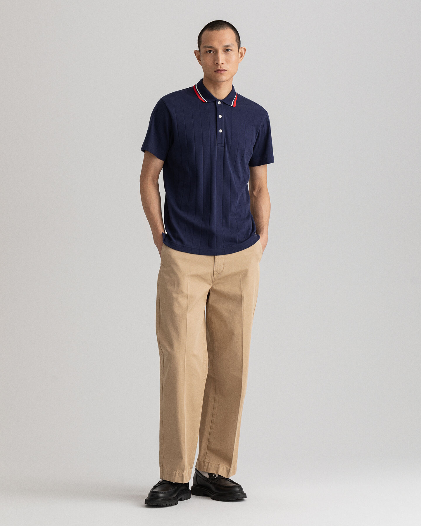 Rugger de manga corta y punto acanalado