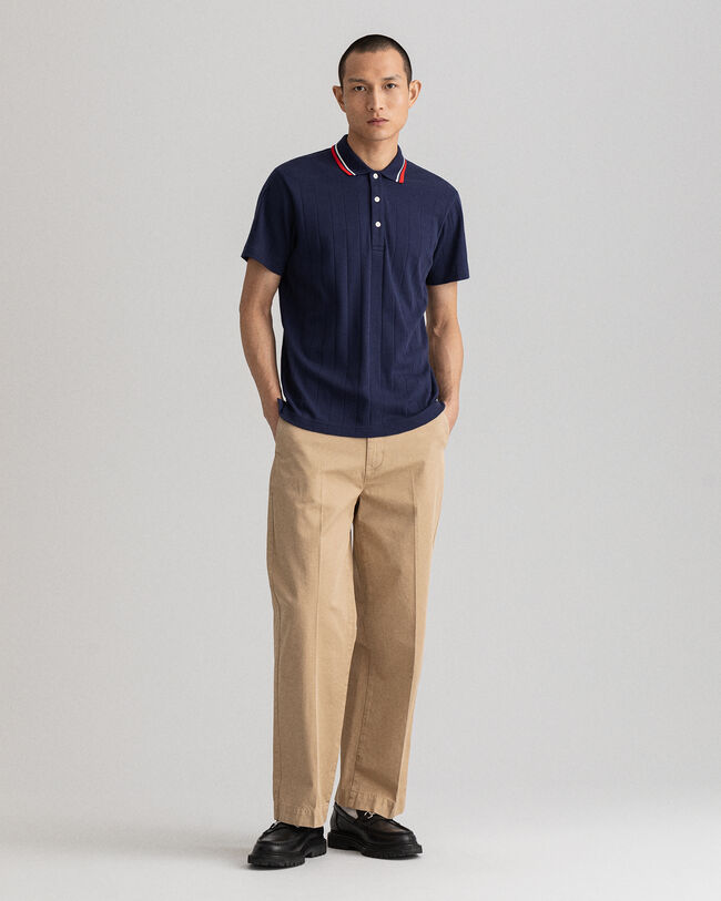 Rugger de manga corta y punto acanalado