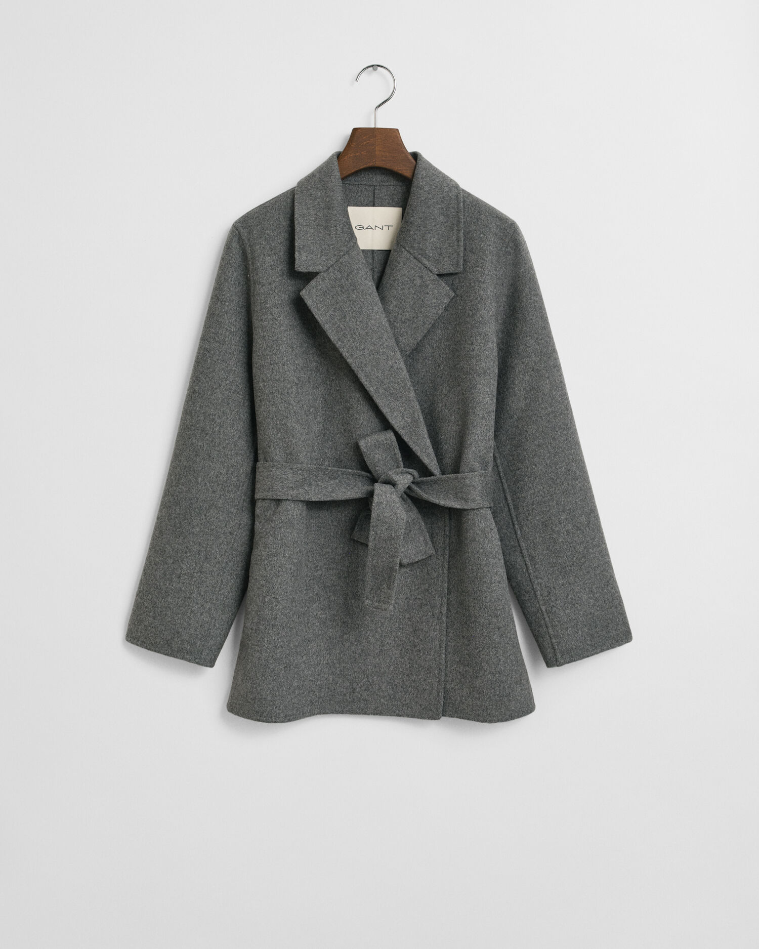 Chaqueta cosida a mano con cinturón