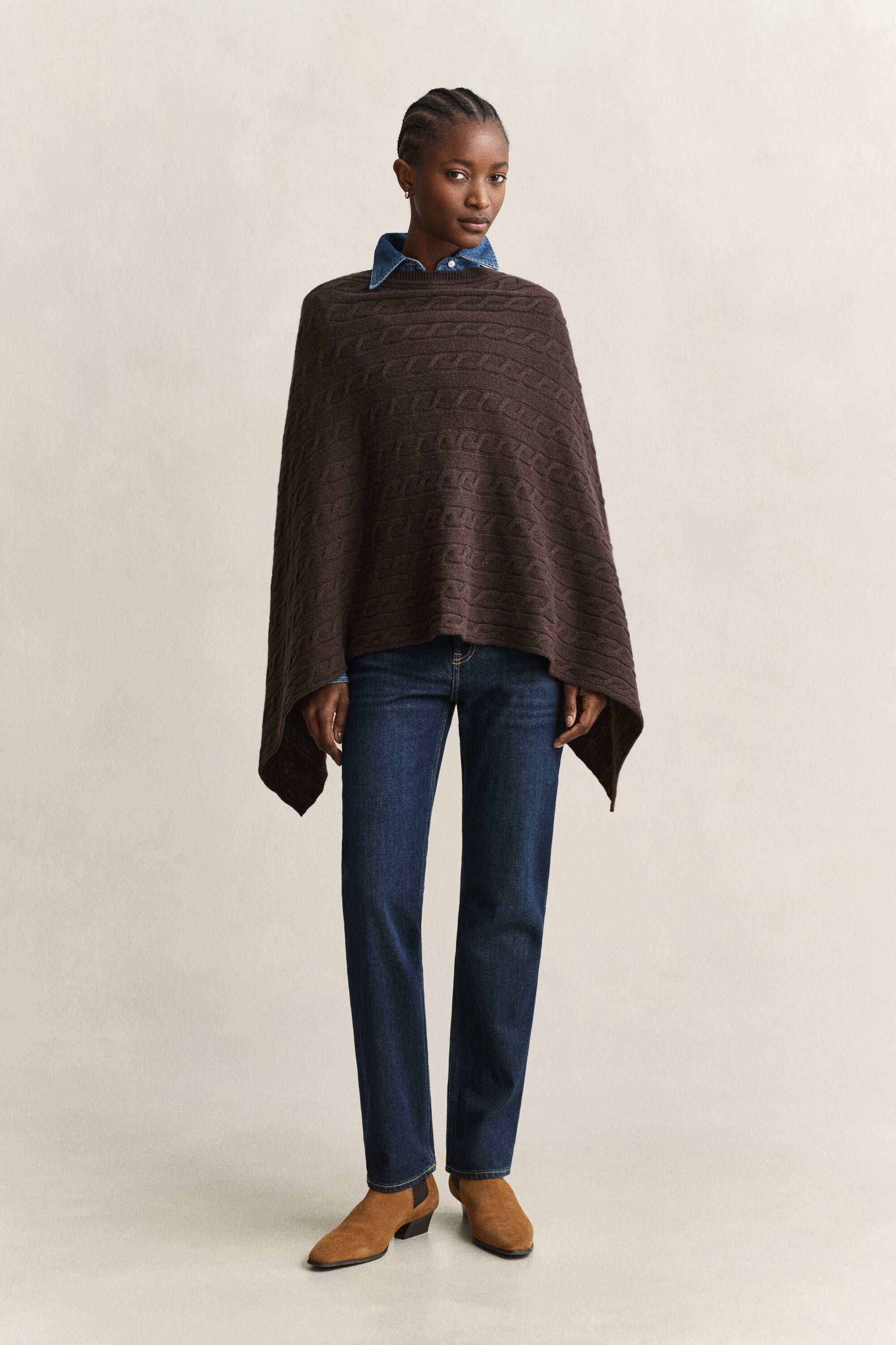 Poncho de punto de ochos de lana