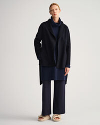 Americana cosida a mano con cinturón