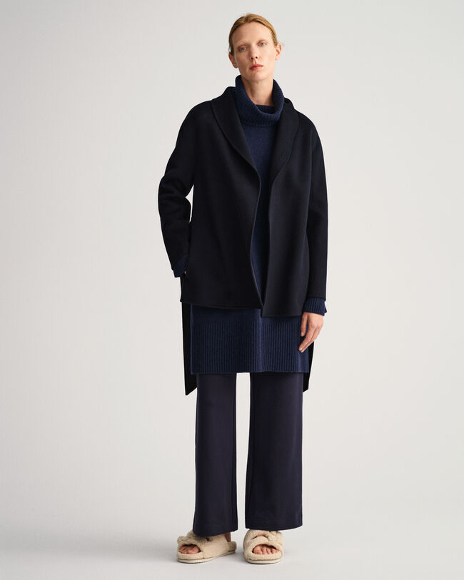 Americana cosida a mano con cinturón