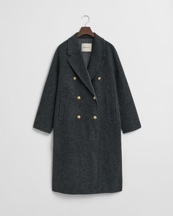 Abrigo de cuadros cosido a mano