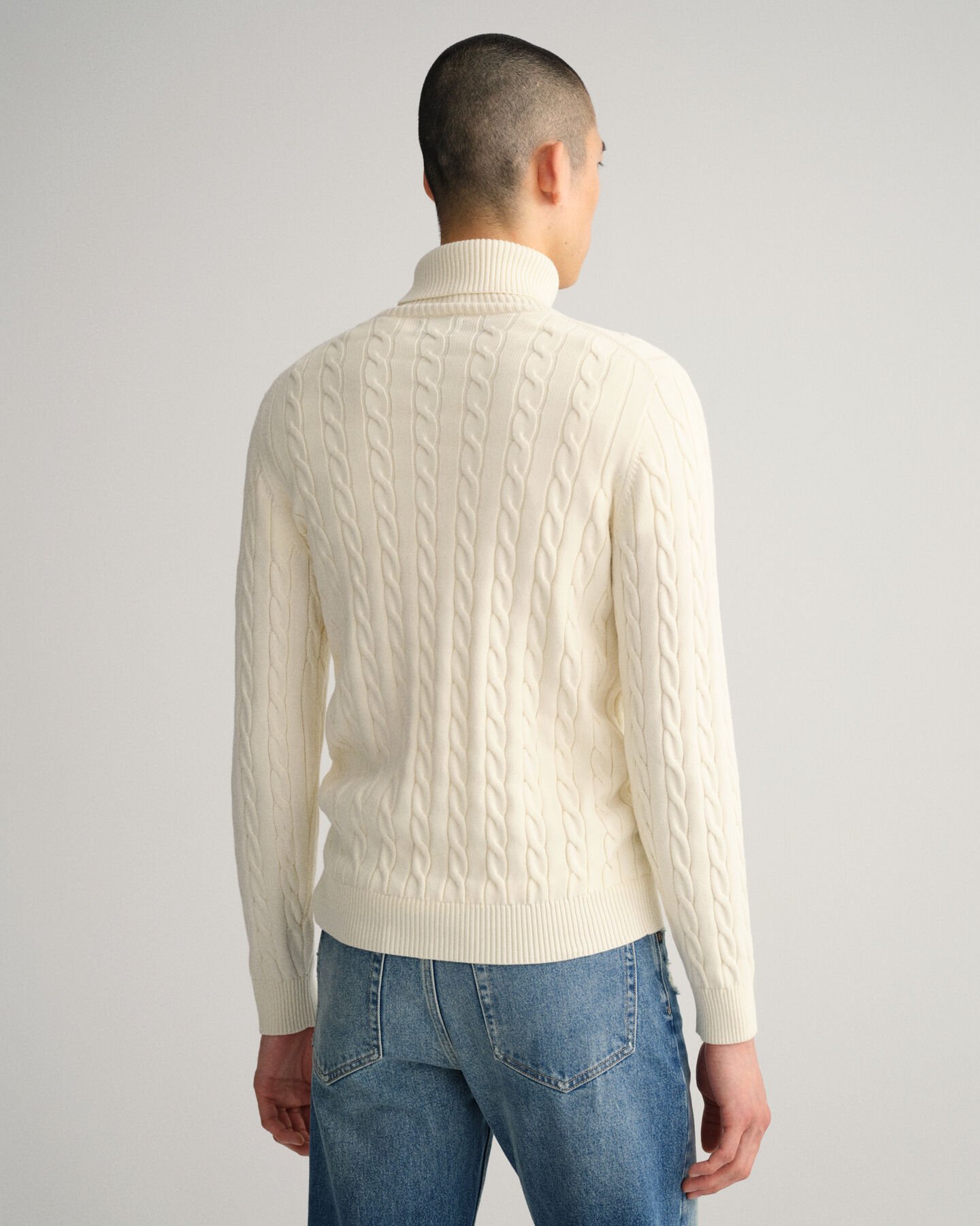 Jersey de cuello de cisne y punto de ochos en algodón