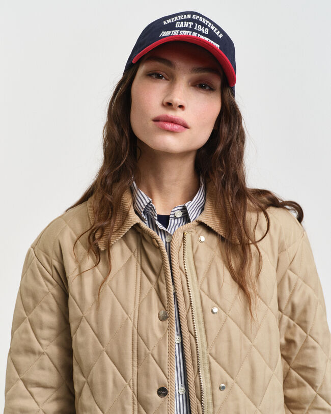 Abrigo acolchado con detalles de pana