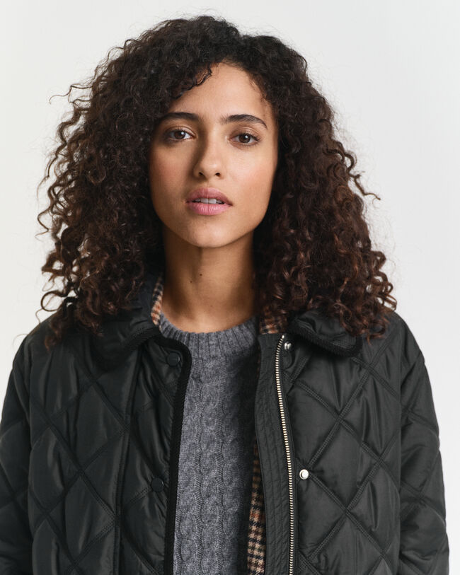 Abrigo acolchado con ribete de pana