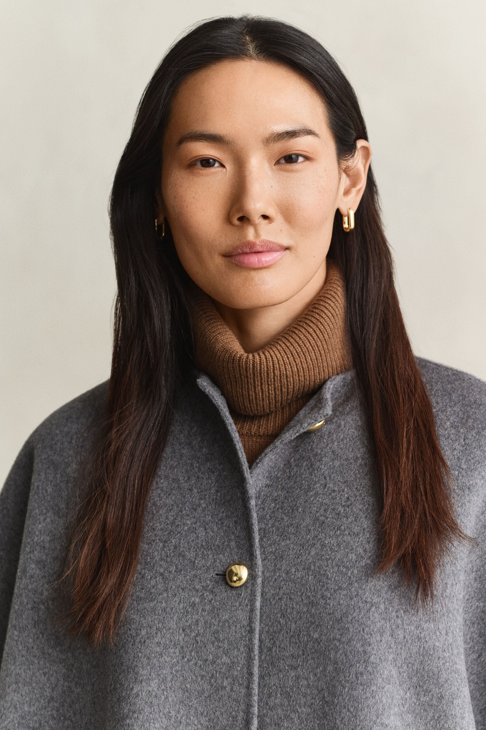 Capa cosida a mano