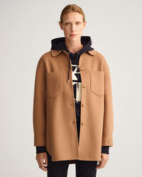 Sobrecamisa cosida a mano