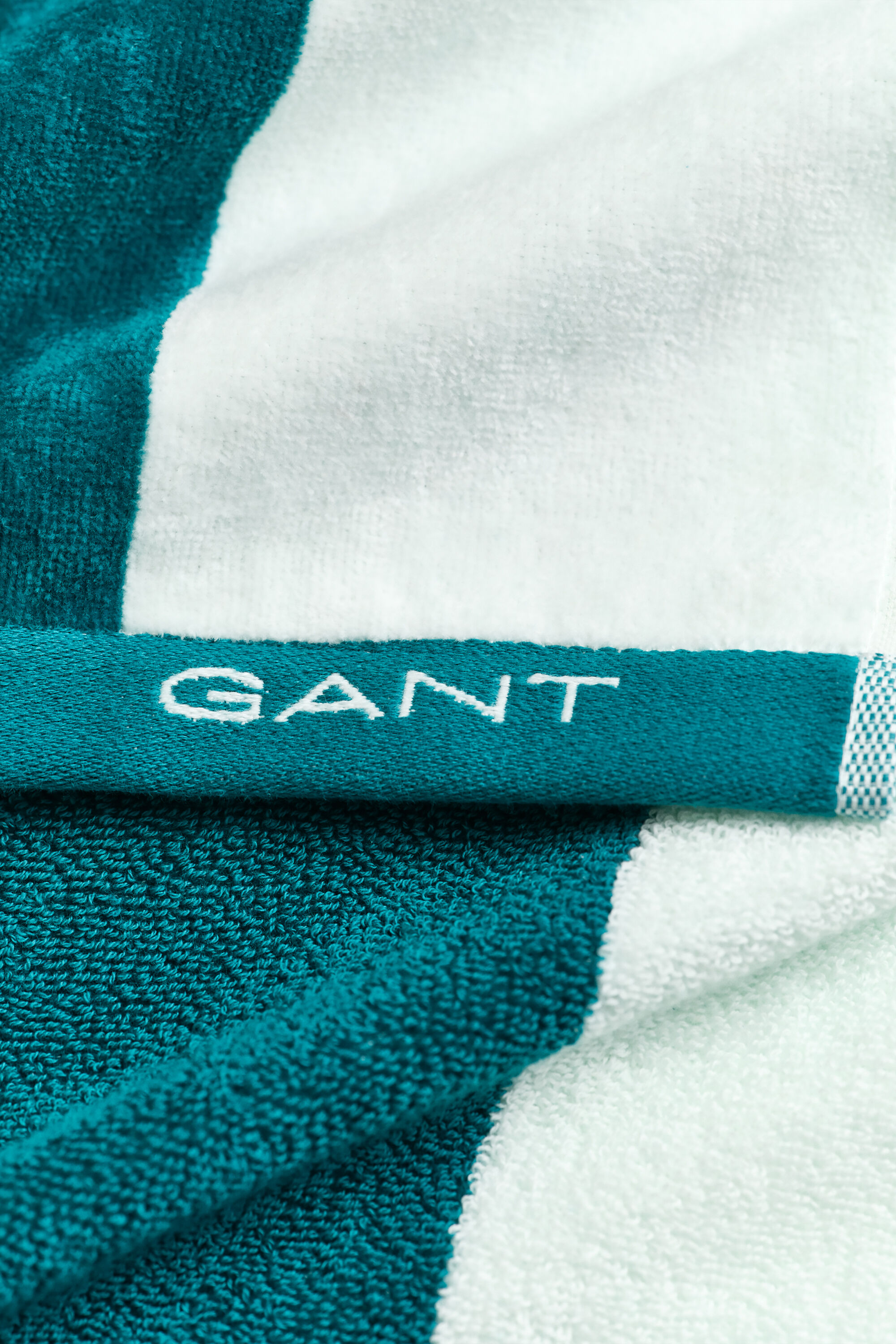 Toalla de playa de rayas gruesas