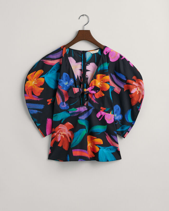 Blusa con mangas volumen y estampado de flores